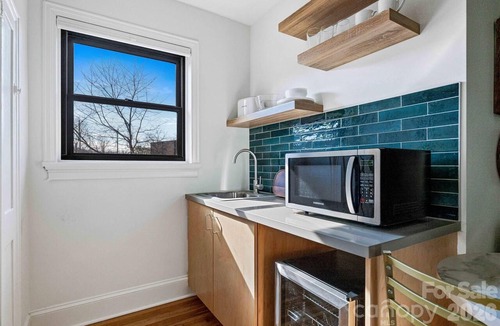 Charlotte Street Condo | Sabel #301 | Downtown Asheville king-suite condo with parking and a skyline view.