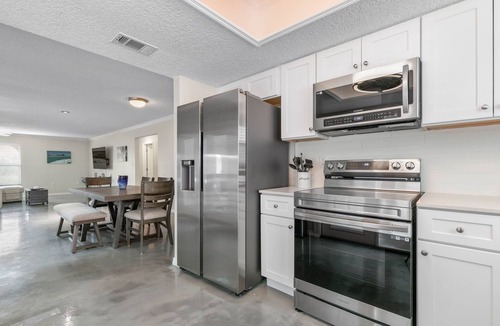 Palm Coast House | Short golf cart ride to the surf and sand near Hammock Beach!