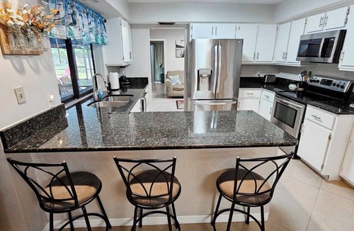 Eight Lakes House | Spacious 4-bedroom house in peaceful Cape Coral with AC, WiFi