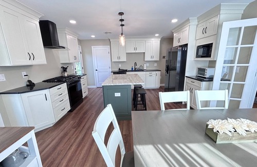Schenectady House | Spacious Glenville Ranch Chef's Kitchen Near Everything Deck Fire Pit