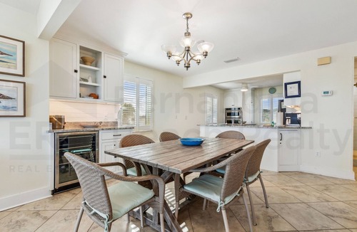 Fernandina Beach House | Spacious living area, windows across entire length of home.