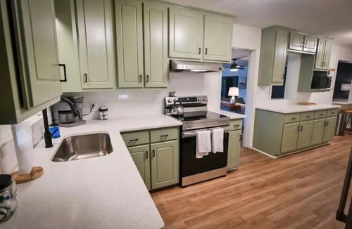 Covington House | Spacious, Town Square, Theatre Room! 4 bed/2 bath Private Home on town square