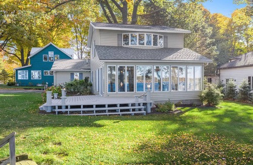 Ludington House | Stunning view of Hamlin Lake, w/deck, fire-pit, screened in porch. Sleeps 6.