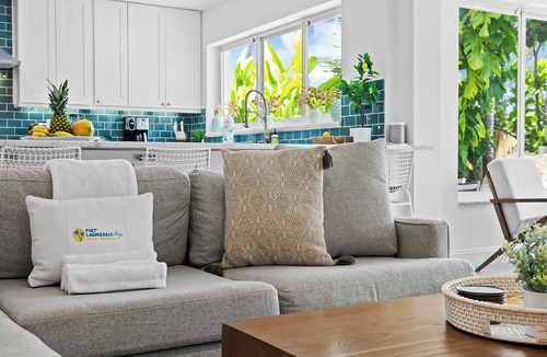 Coral Shores House | Stylish Modern Tropical Waterway Retreat with Private Pool Near Beaches!