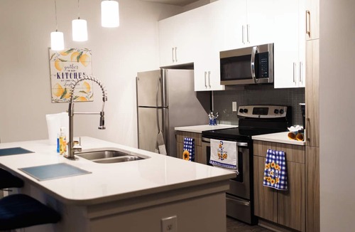 Westside Apartment | Stylish West Midtown Retreat with Rooftop Pool, Steps to the Stadium