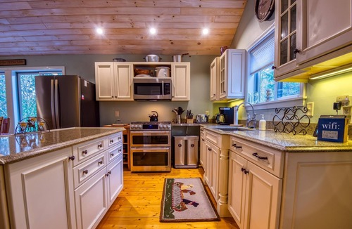 Rangeley Plantation House | The 4 Seasons on Mooselookmeguntic Lake with dock, mooring, 4 kayaks, fire pit, and pet friendly!