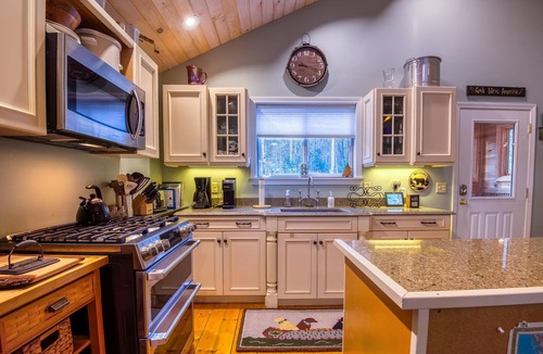 Rangeley Plantation House | The 4 Seasons on Mooselookmeguntic Lake with dock, mooring, 4 kayaks, fire pit, and pet friendly!