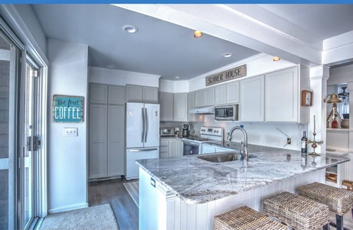 West Beach House | UnWynd and start your beach vacation just steps from the beach!