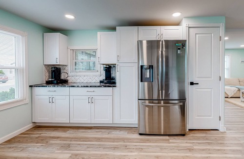Montego Bay House | Updated dog-friendly home with gas grill, 2 pools, 2 tennis courts, fishing pier