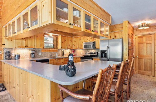 Drake Cabin | WATER FRONT Updated Cabin Close to Estes Park New Hot Tub 3 Private Acres