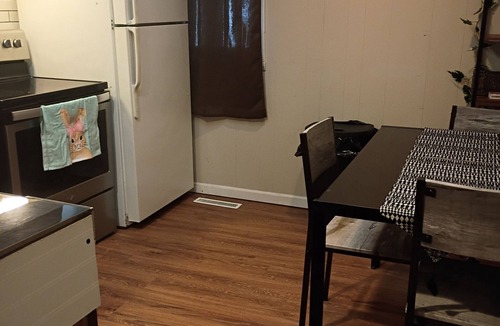 Mount Pleasant House | Wonderful unit located downtown with alleyway parking, perfect for quiet stays.