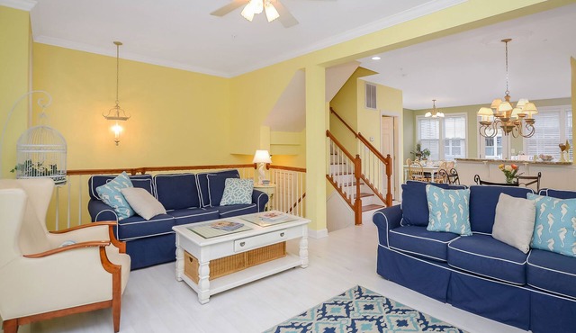Bright, fun 5-bedroom townhouse in exclusive gated community with free WiFi, an indoor/outdoor pool, private bayside beaches, a restaurant, and more!