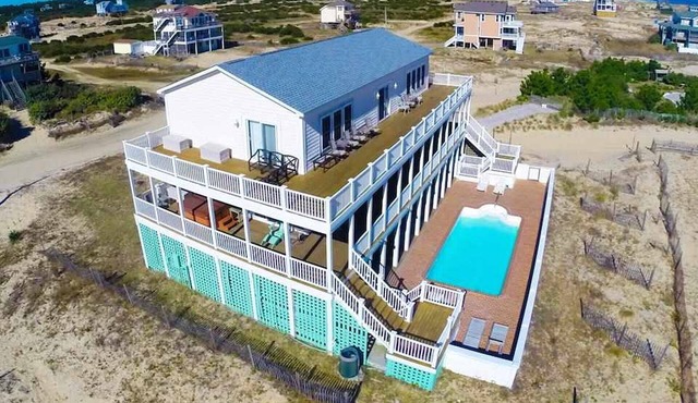 Family 4x4 luxury, steps from the beach, pool, hot tub, theater, Sunday rental, wifi