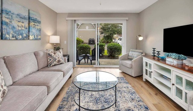 First floor condo with access to heated pool!