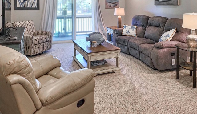Golf escape with beach access, balcony, patio, fast WiFi & AC