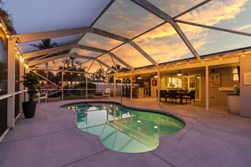 Heated PoolFire PitOutdoor KitchenCorn Hole