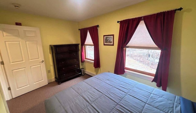 Queen Room in Riverfront Lodge in West Forks