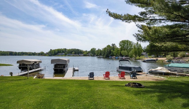 Spacious 5-bedroom lake house with private beach and lots of amenities.