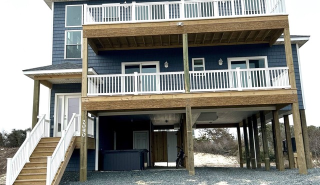 STEPS FROM THE WATER! BEAUTIFUL NEW HOME IN THE HEART OF 4x4 WILD HORSE CAROVA