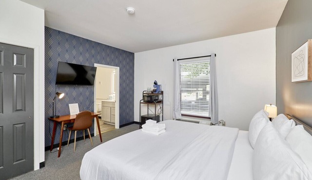 The West End Hotel King bed by Cortex, Forest Park & BJC