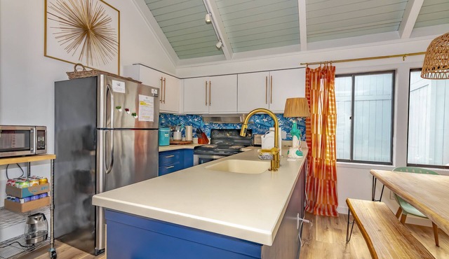 Walk to the beach or pool in this cozy villa. 2 deck spaces with 2 golf carts for enjoyment