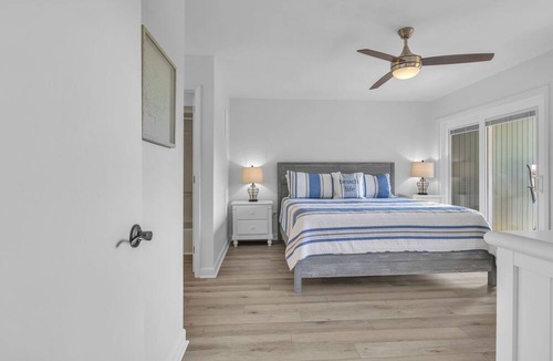 Caswell Beach Condo | Beach Getaway Among the Oaks: Community Pools, Short Walk to Beach Access