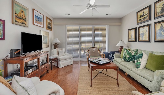 Long distance marsh views and community pool.